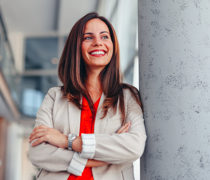 Woman leaning on a wall