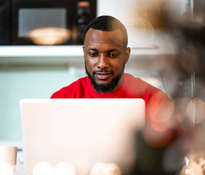 Man looking at laptop