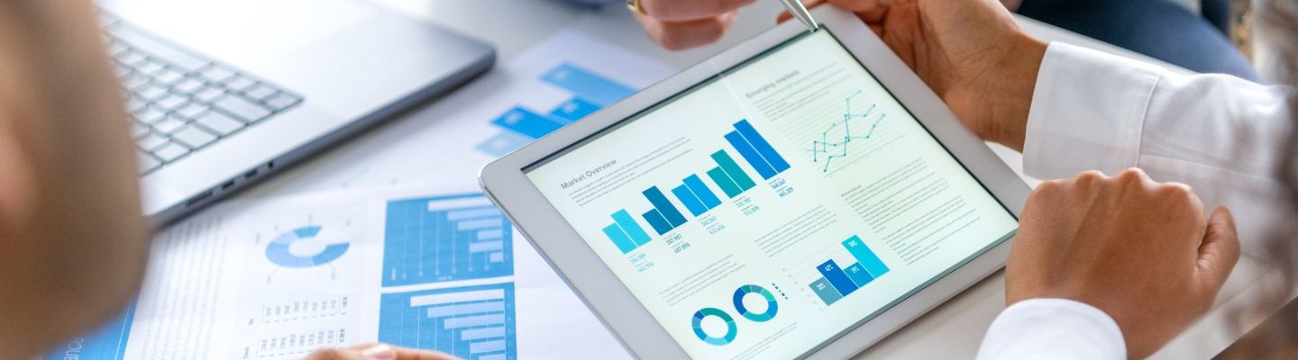 laptop and spreadsheets