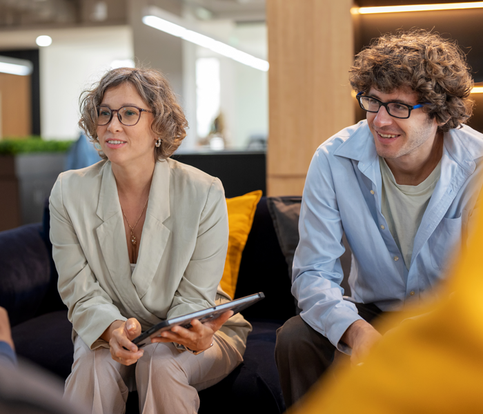 Two people sitting down