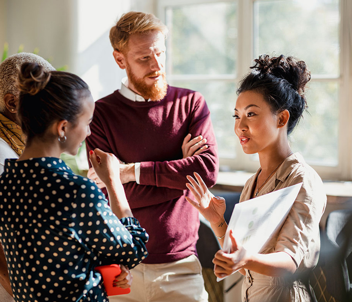 A group of people having a meeting