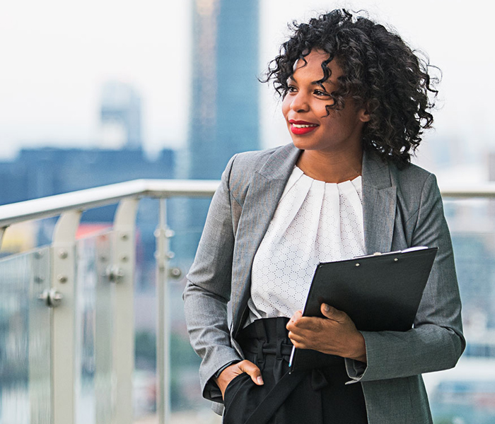 Woman holding a clipboard